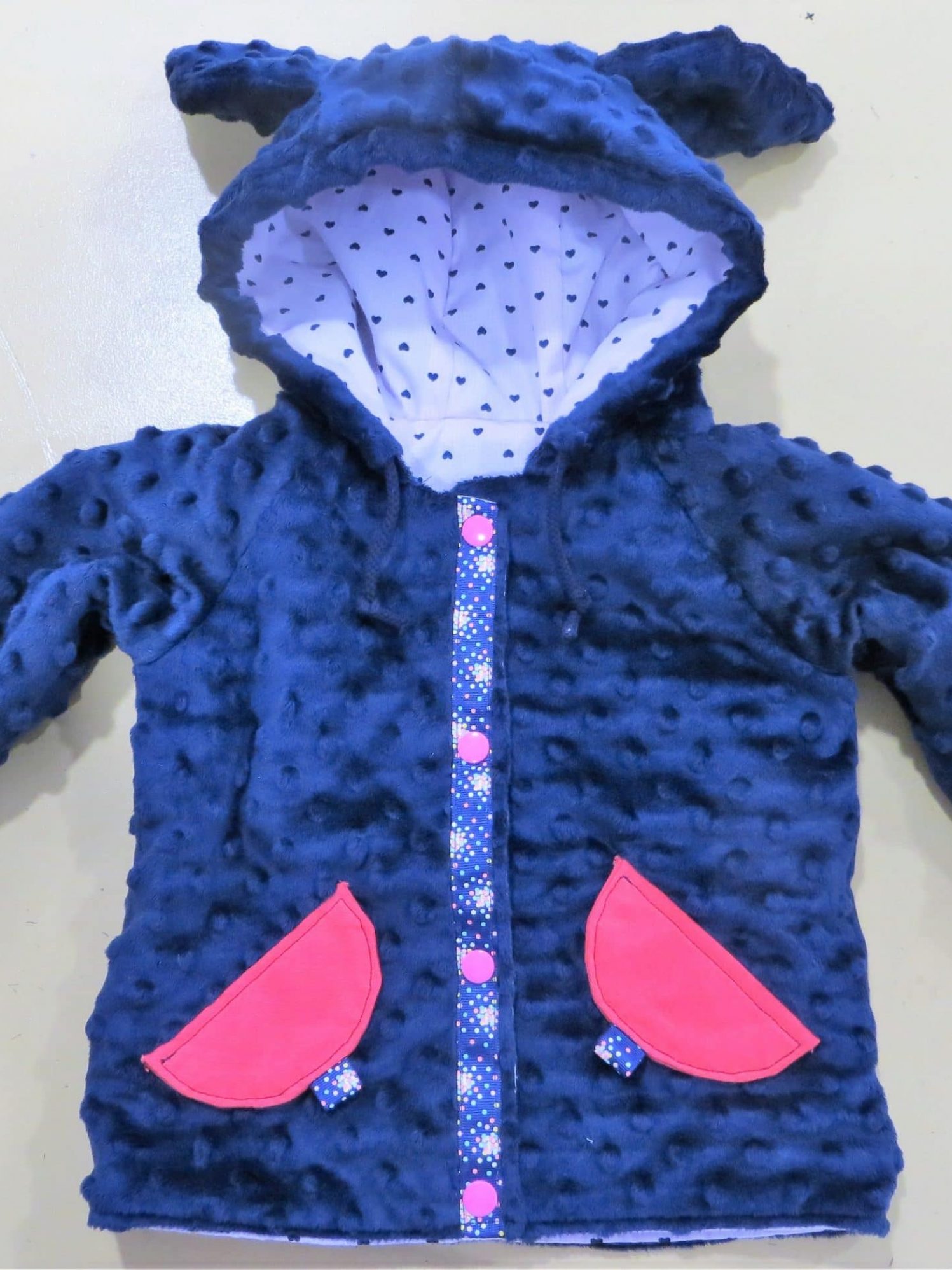 Une veste enfant réversible bleue